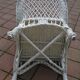 white wicker armchair