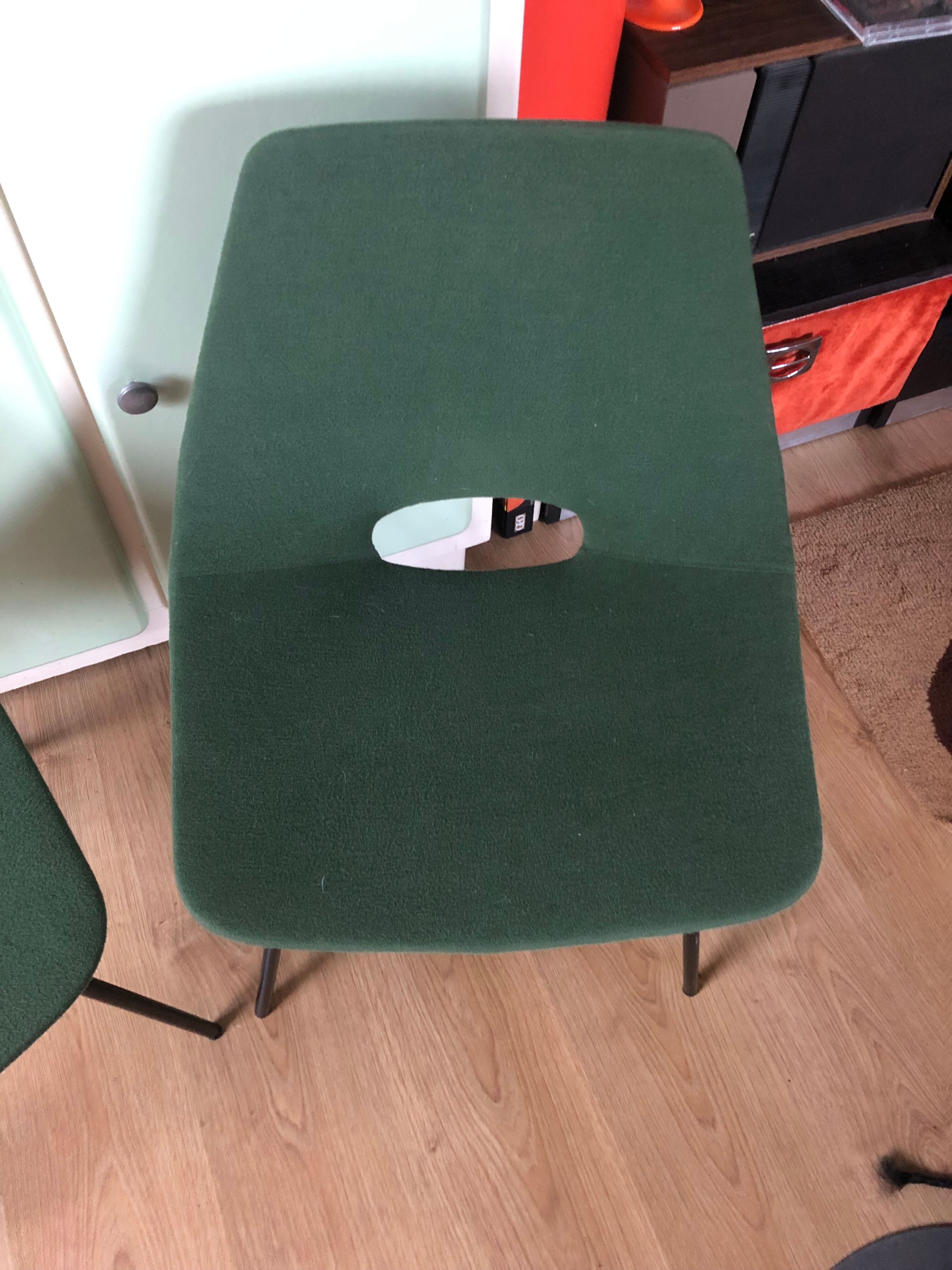 Pair of tonneau chairs by Guariche Pierre for Steiner. 50