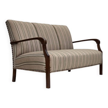 Canapé 2 places danois des années 1950, en tissu en laine beige, pieds en bois de hêtre.