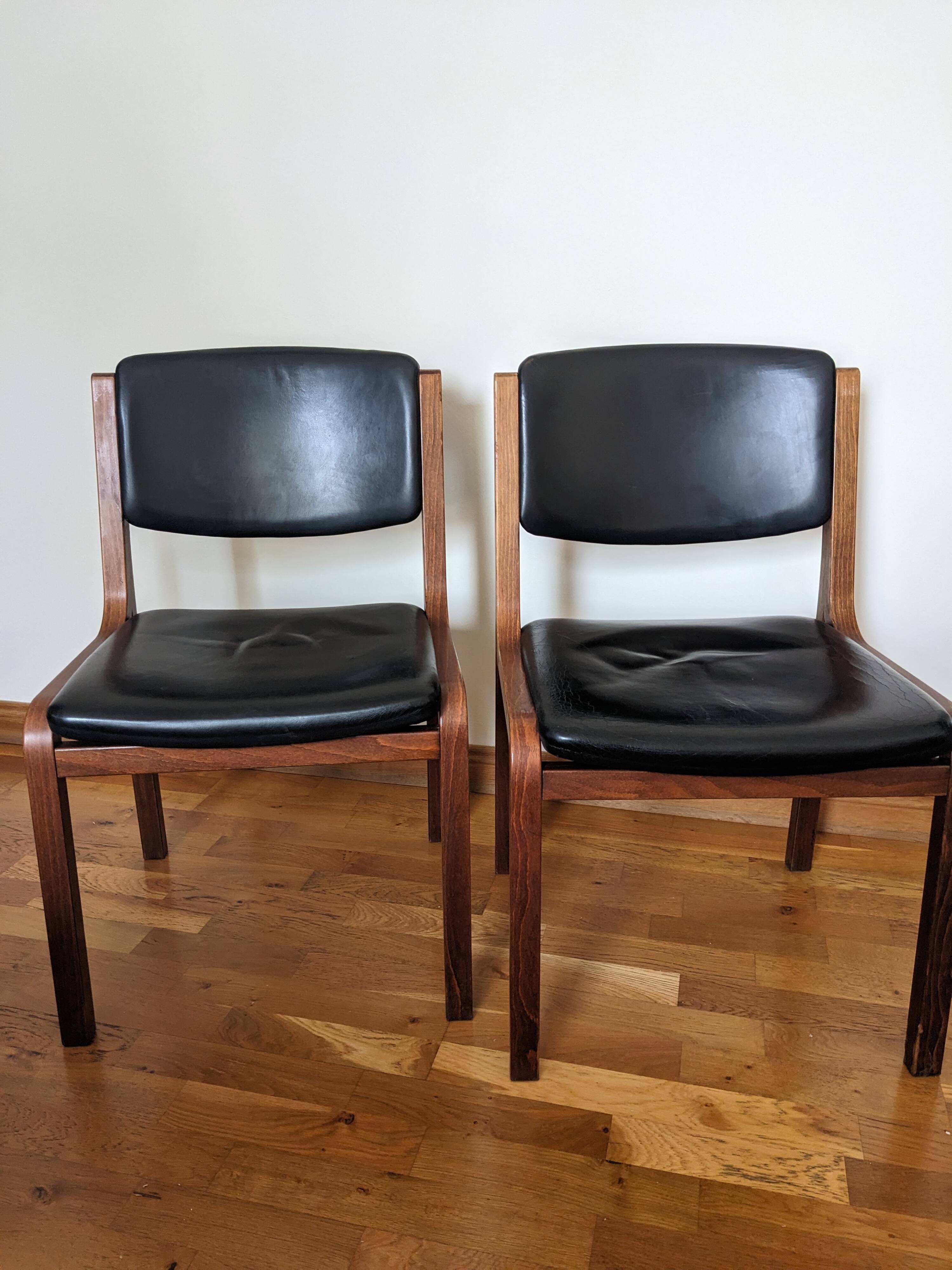 Vintage leather and wood chair pair