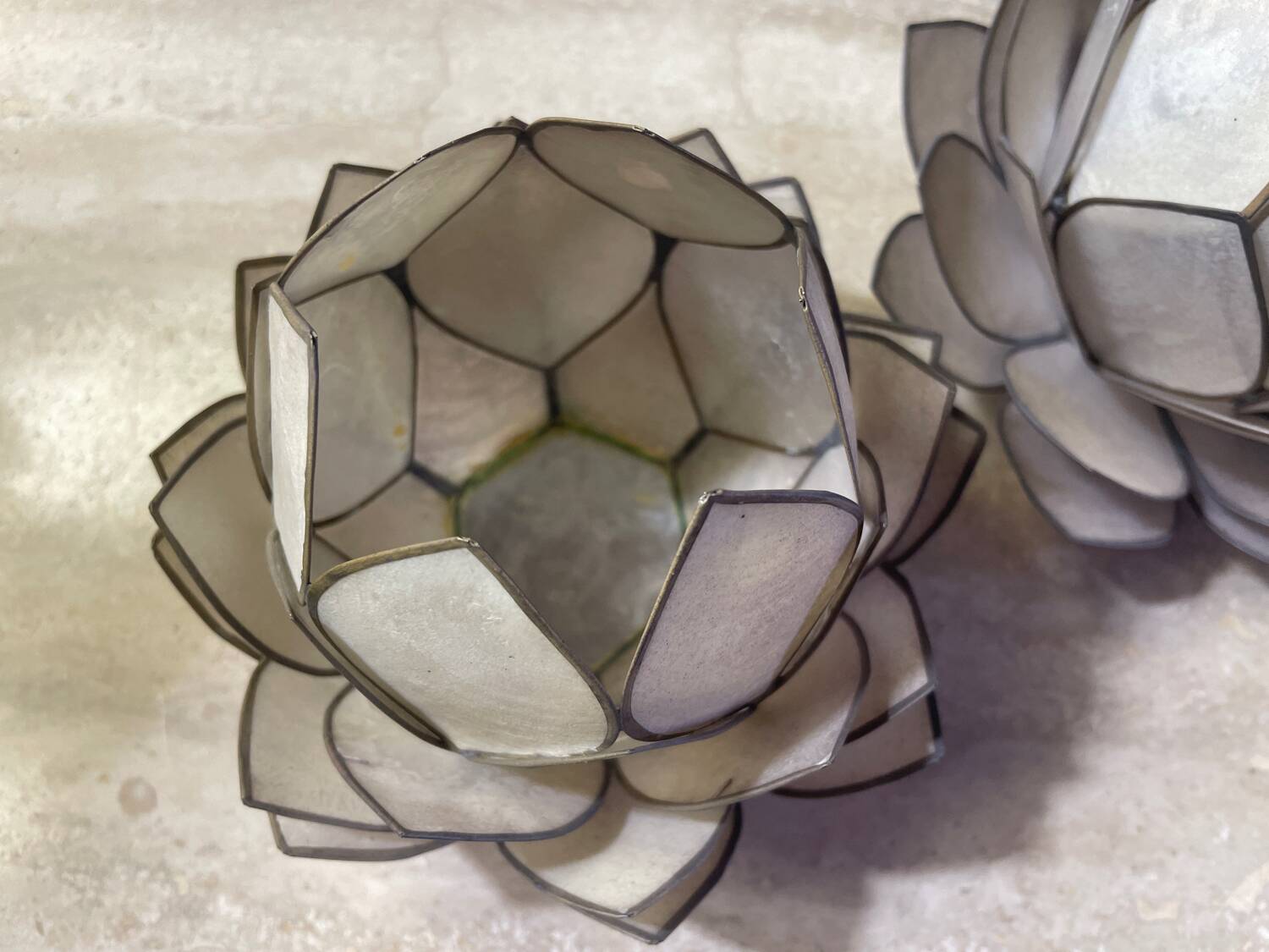 Mother-of-pearl and brass candlesticks