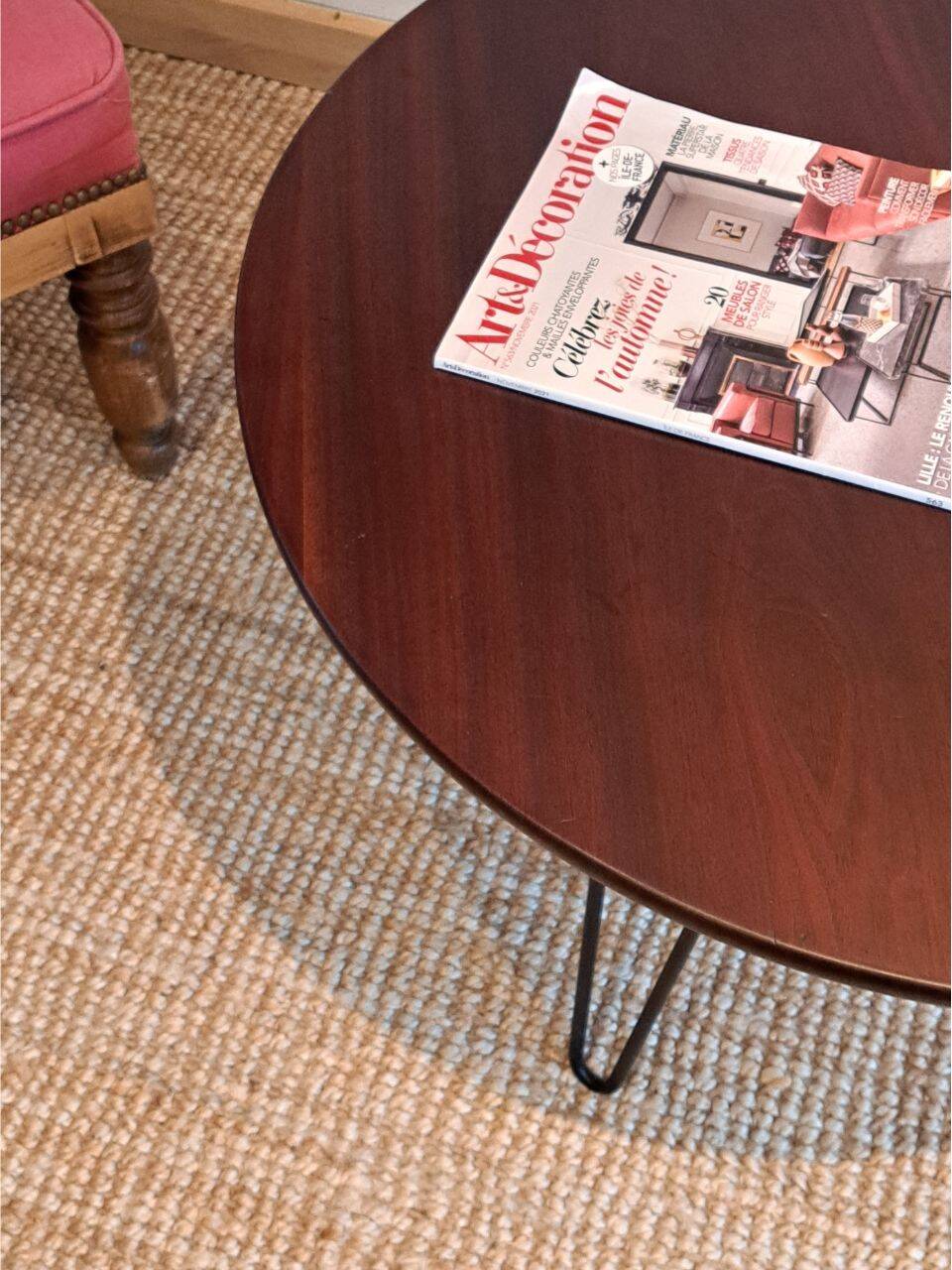 Round coffee table with mahogany wood top