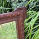 Antique carved wooden mirror