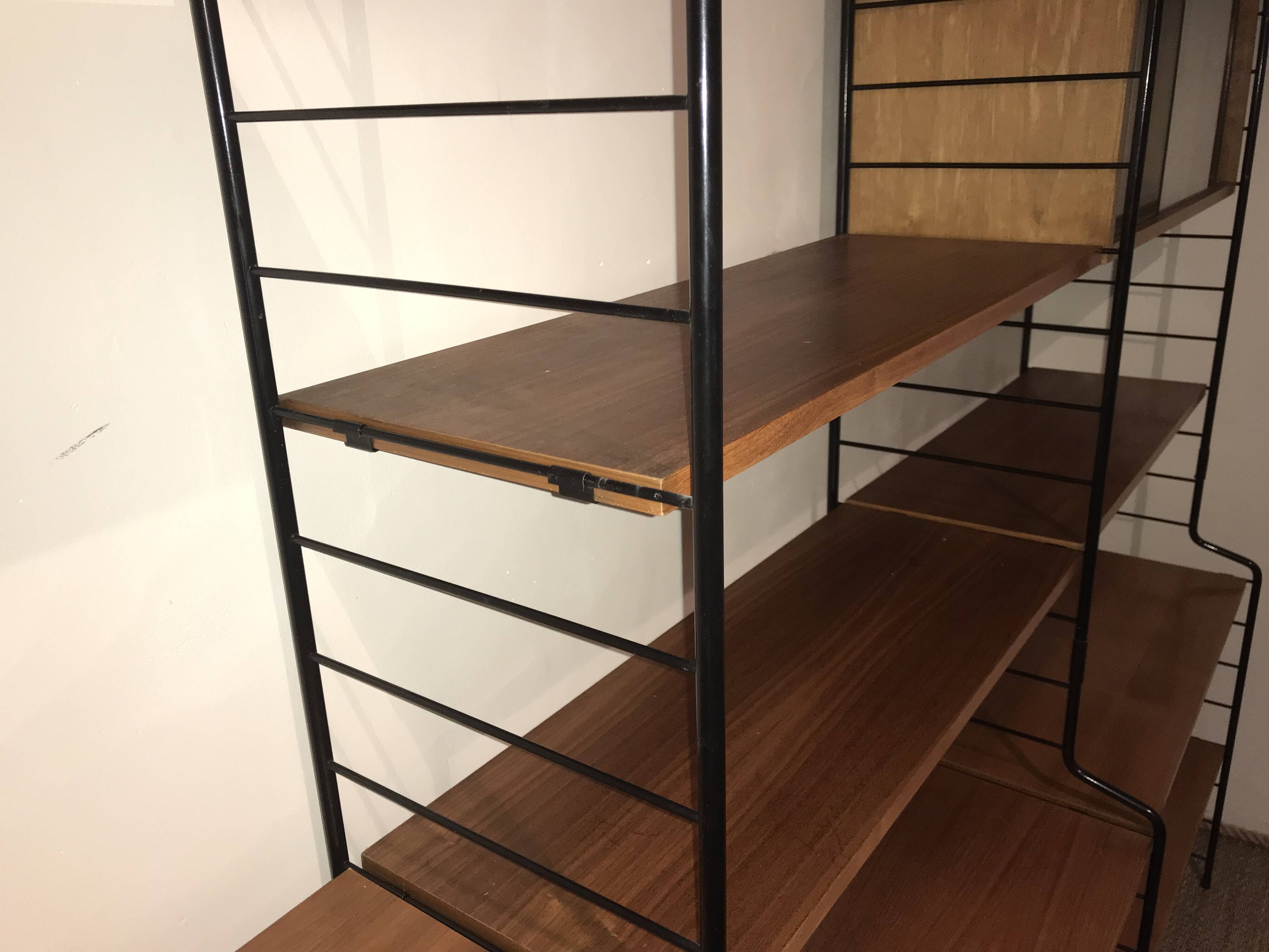 Vintage modular wall-mounted library shelf in blond walnut 1960-80