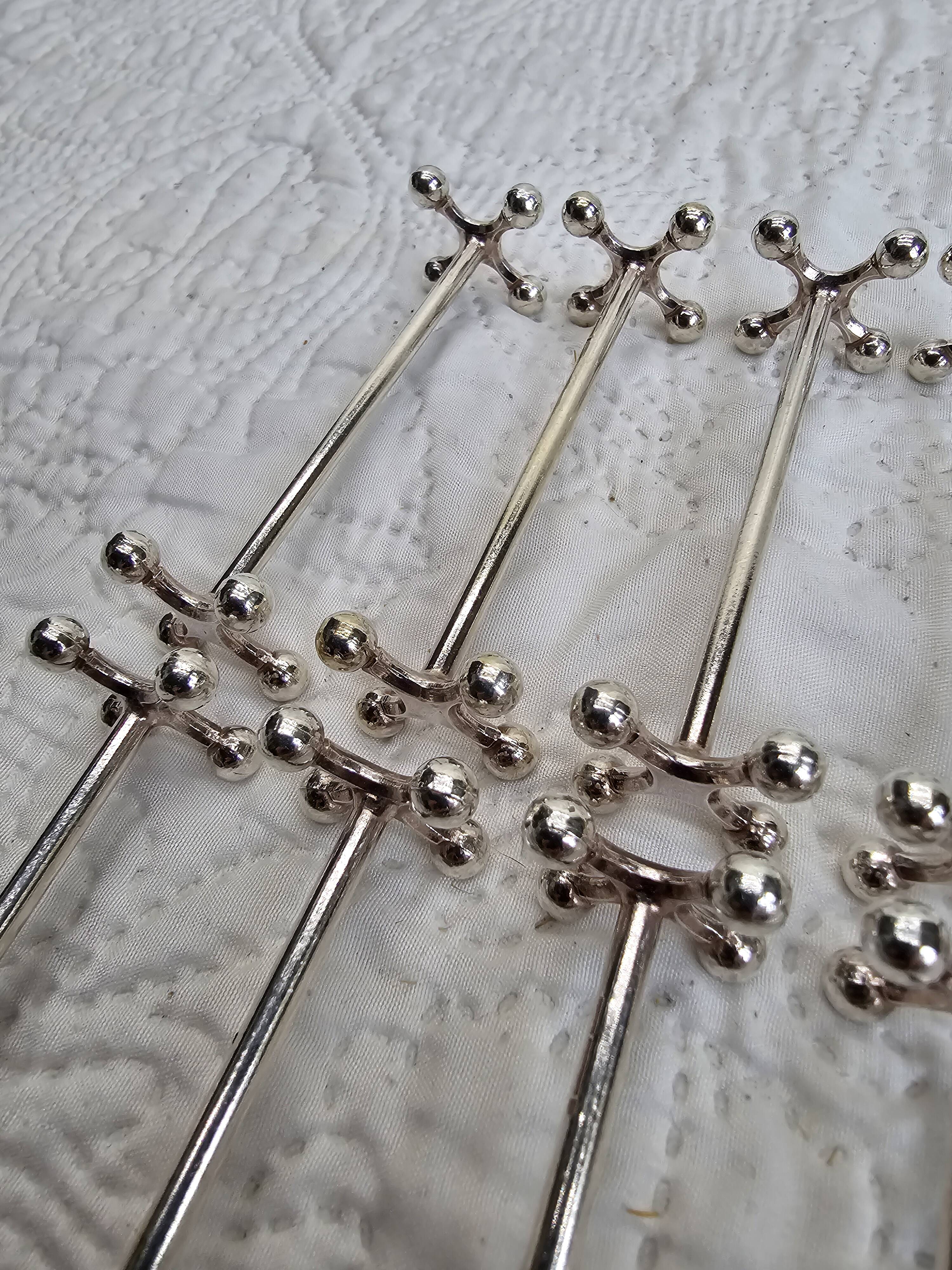 Christofle knife holder (12) in silver-plated metal, Perle model