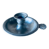 Old aluminum candle holder