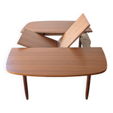 Scandinavian teak square extendable table from the 1960s.