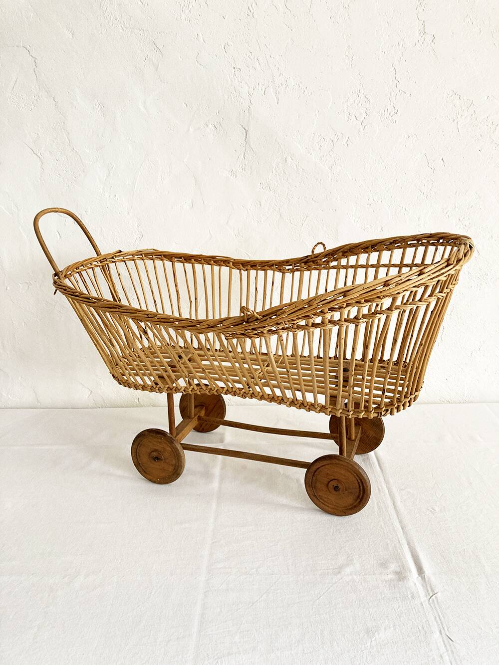 Old rattan doll's pram
