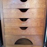 Old black wardrobe - wooden drawers and labels of origin