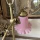 Large vintage lamp in brass with a pink opaline shade.