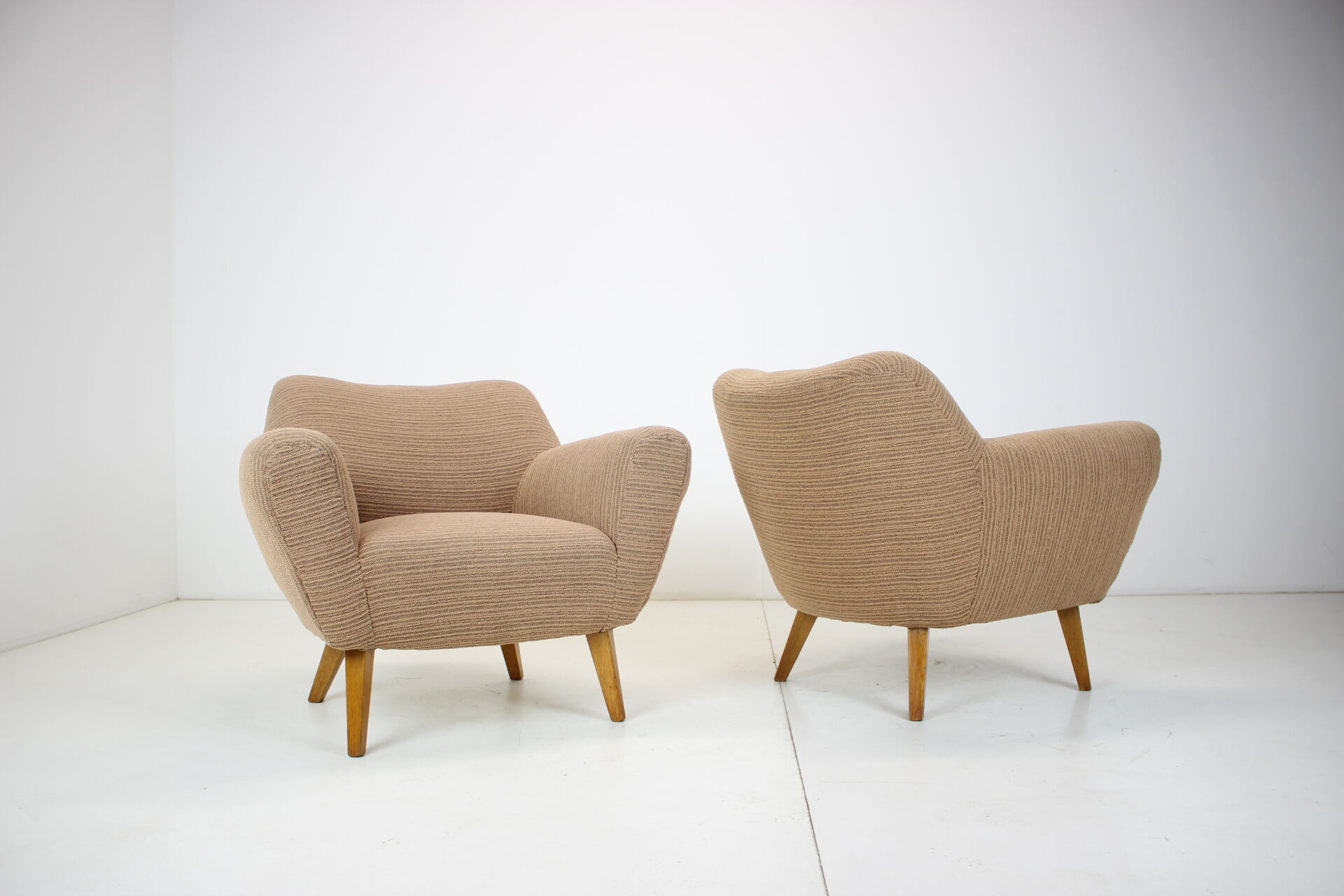 Pair of design club armchairs, 1970's.