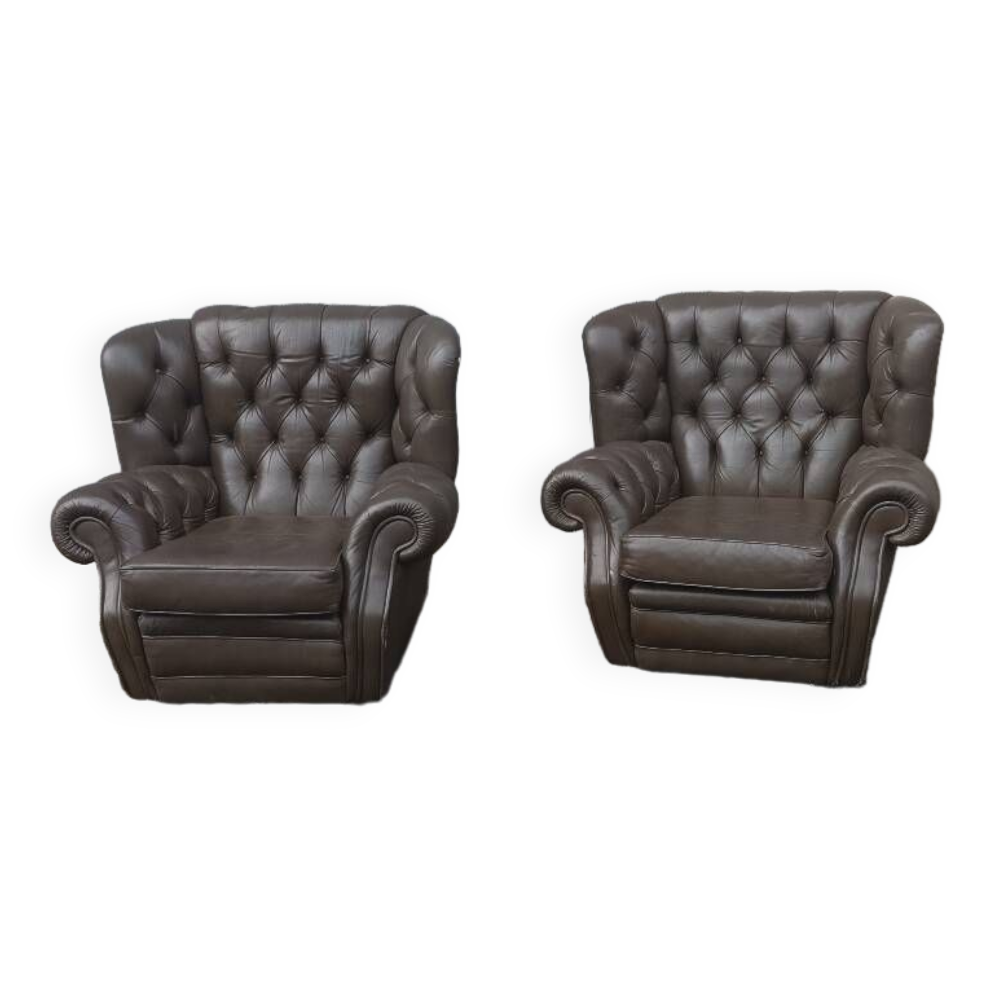 Pair of Chesterfield armchairs with footrest