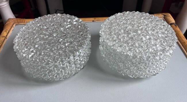 Pair of round vintage moulded glass ceiling lights.