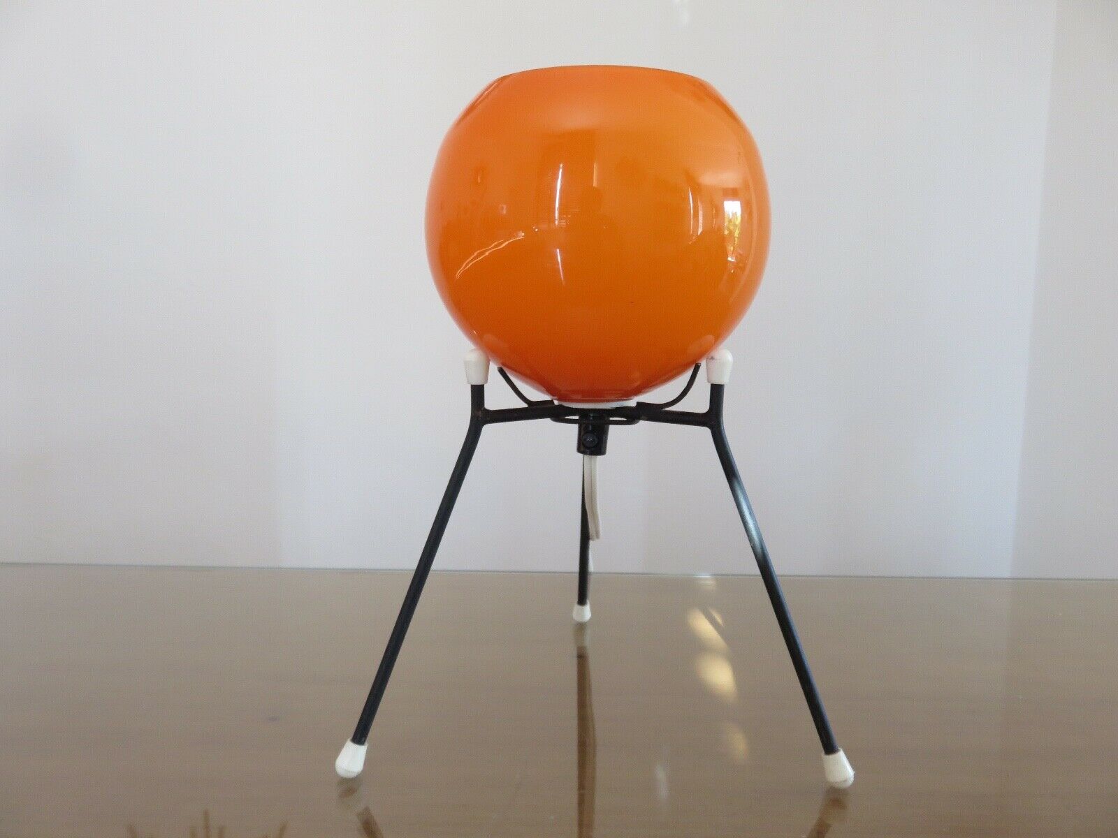 Tripod lamp "Sputnik" in orange opaline and black lacquered metal 60s 70s