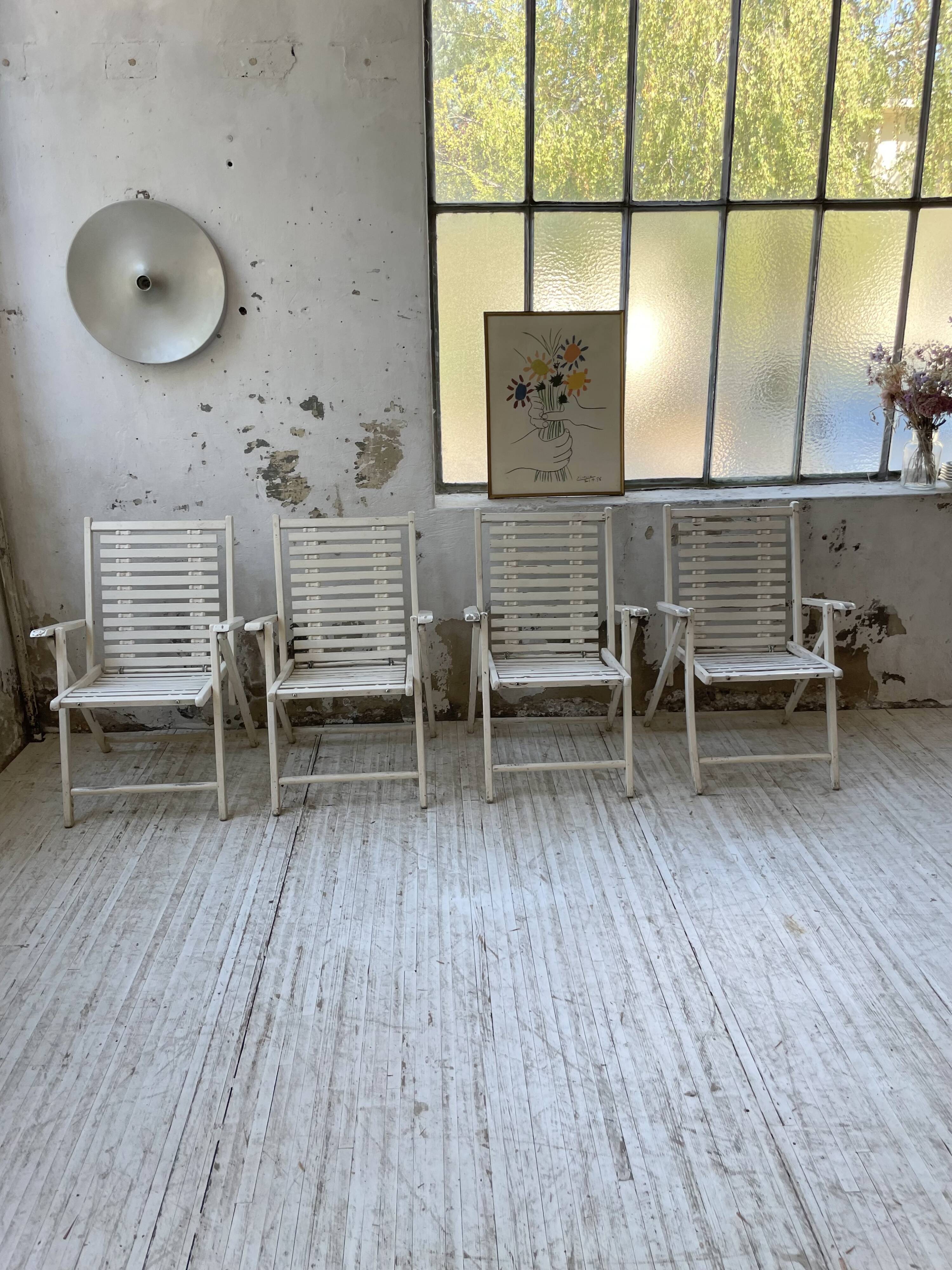 4 white wooden garden chairs