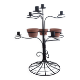 Vintage seven-light terracotta metal candlestick