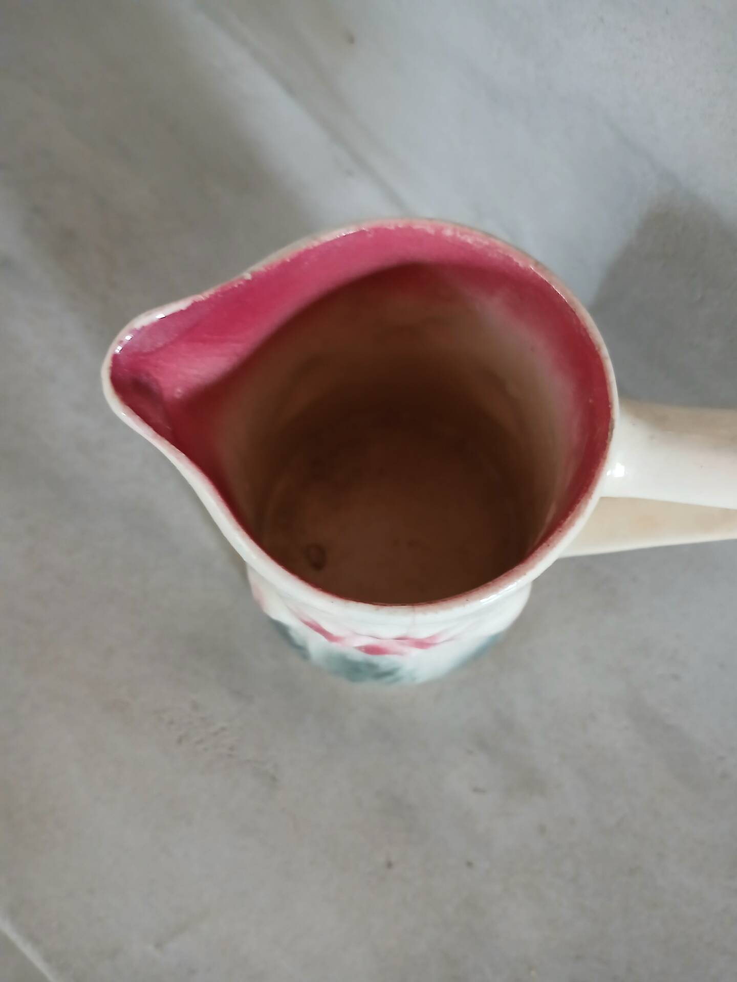 Small antique jug in slipware.