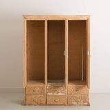 Solid pine cabinet fully stripped consisting of 3 doors and 6 drawers