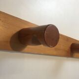 Charlotte Perriand, pair of fir wall coat racks, French work, around 1970