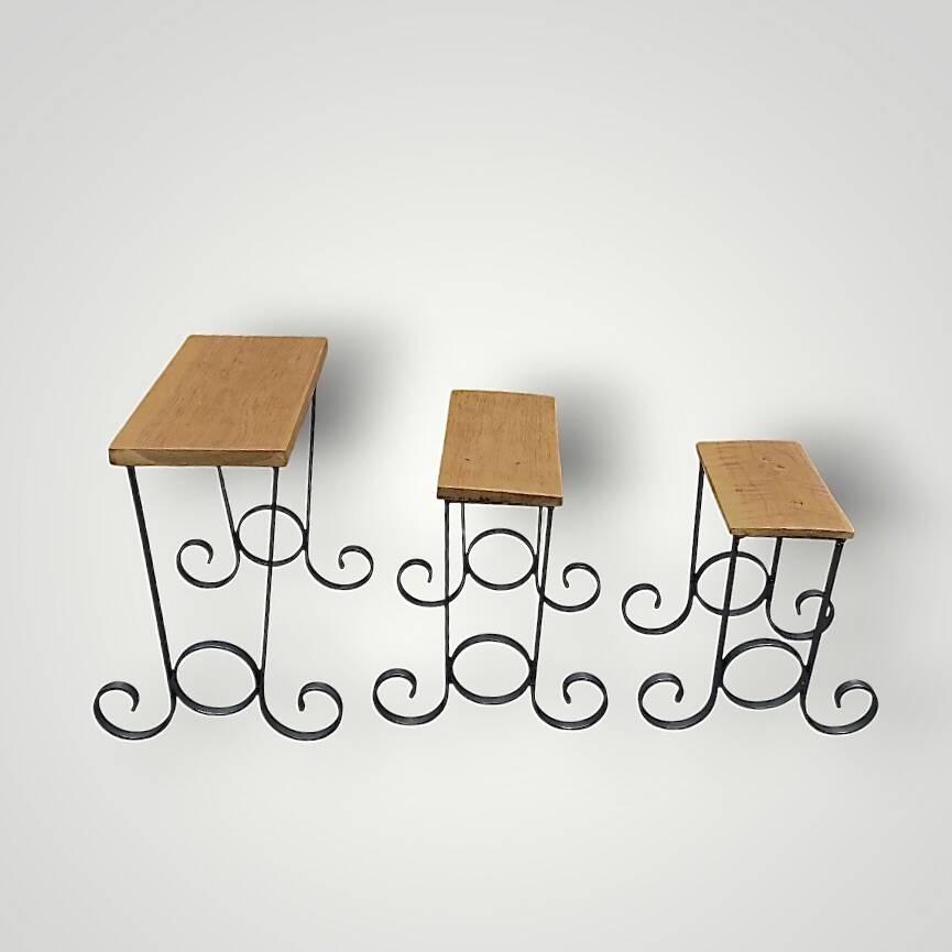 Antique wooden and wrought iron nesting tables – circa 1950