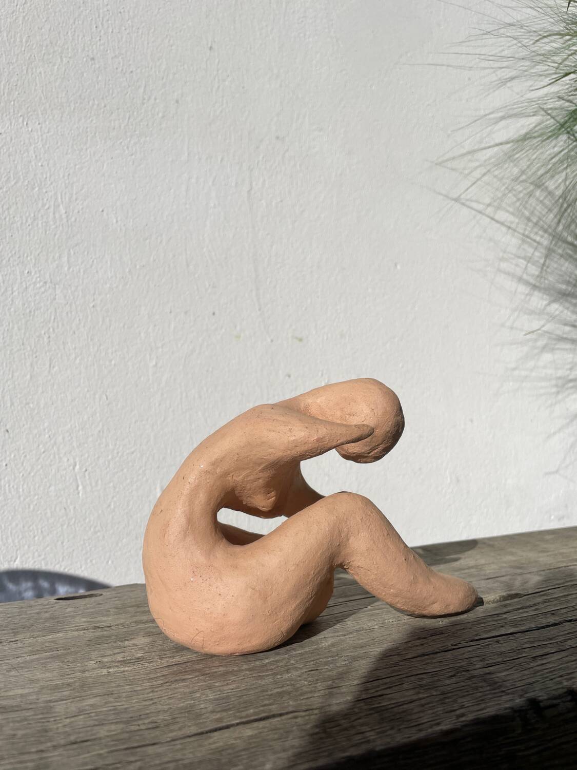 Terracotta sculpture figurine of a woman