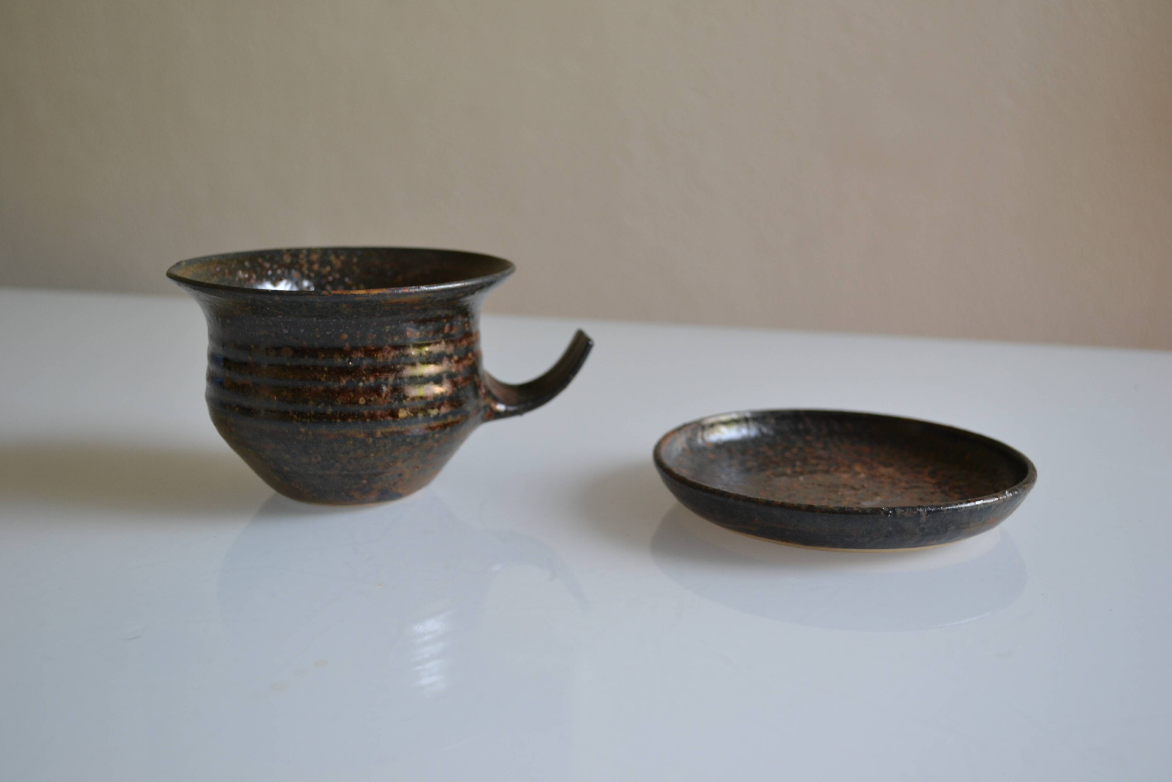 1970s ceramic cup and saucer signed