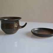 1970s ceramic cup and saucer signed