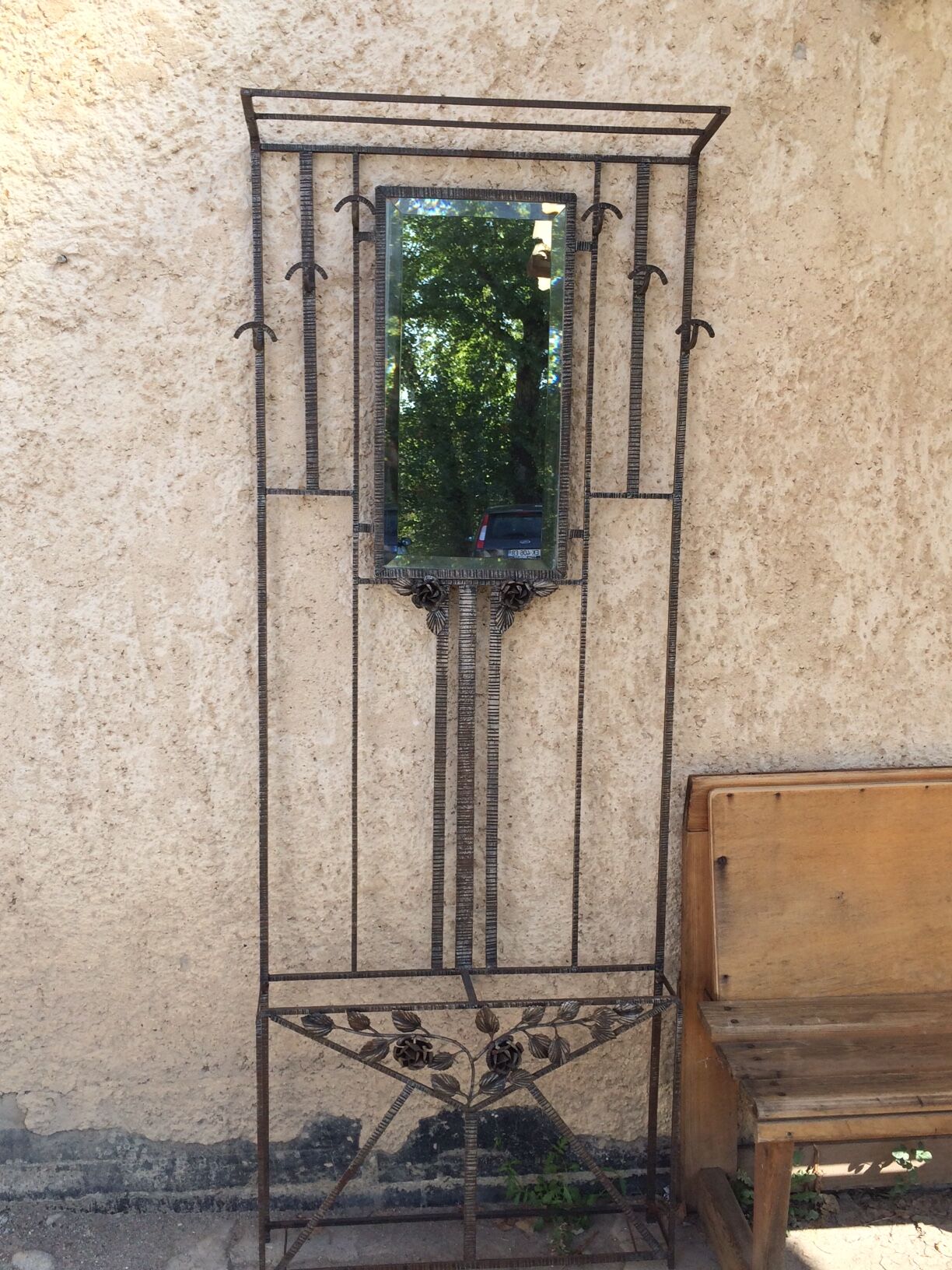 Old Art Deco coat rack in hammered iron