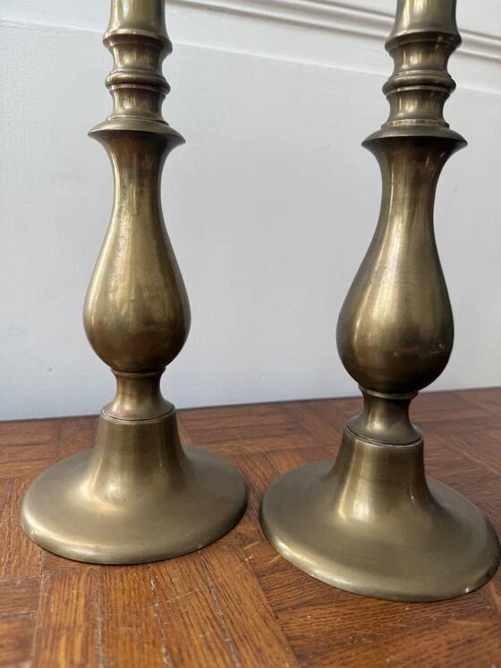 2 large brass candle holders
