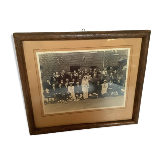 Old wedding photograph with a military bride and groom