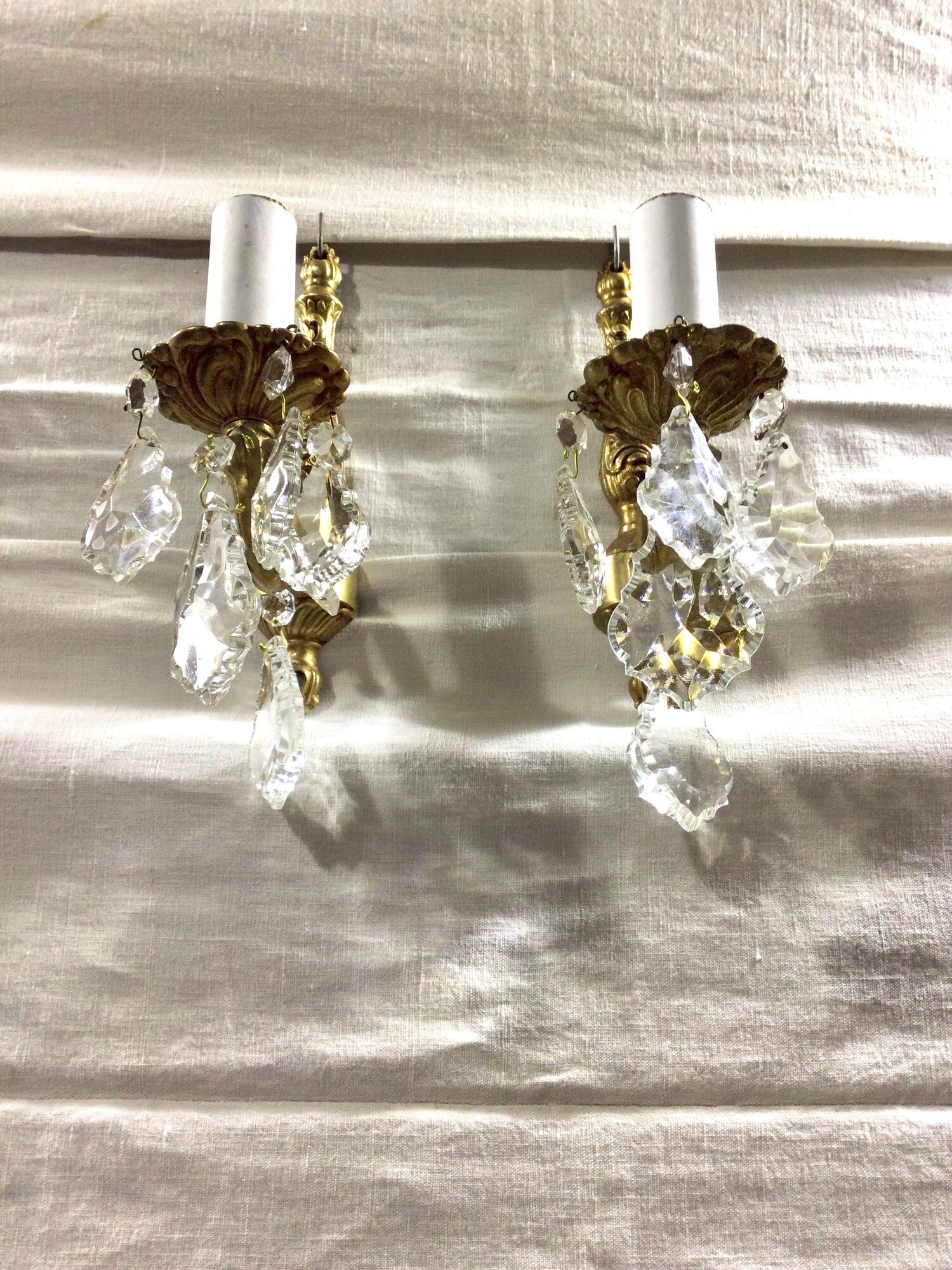Pair of 1-light bronze sconces and Louis XV style stamps