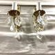 Pair of 1-light bronze sconces and Louis XV style stamps