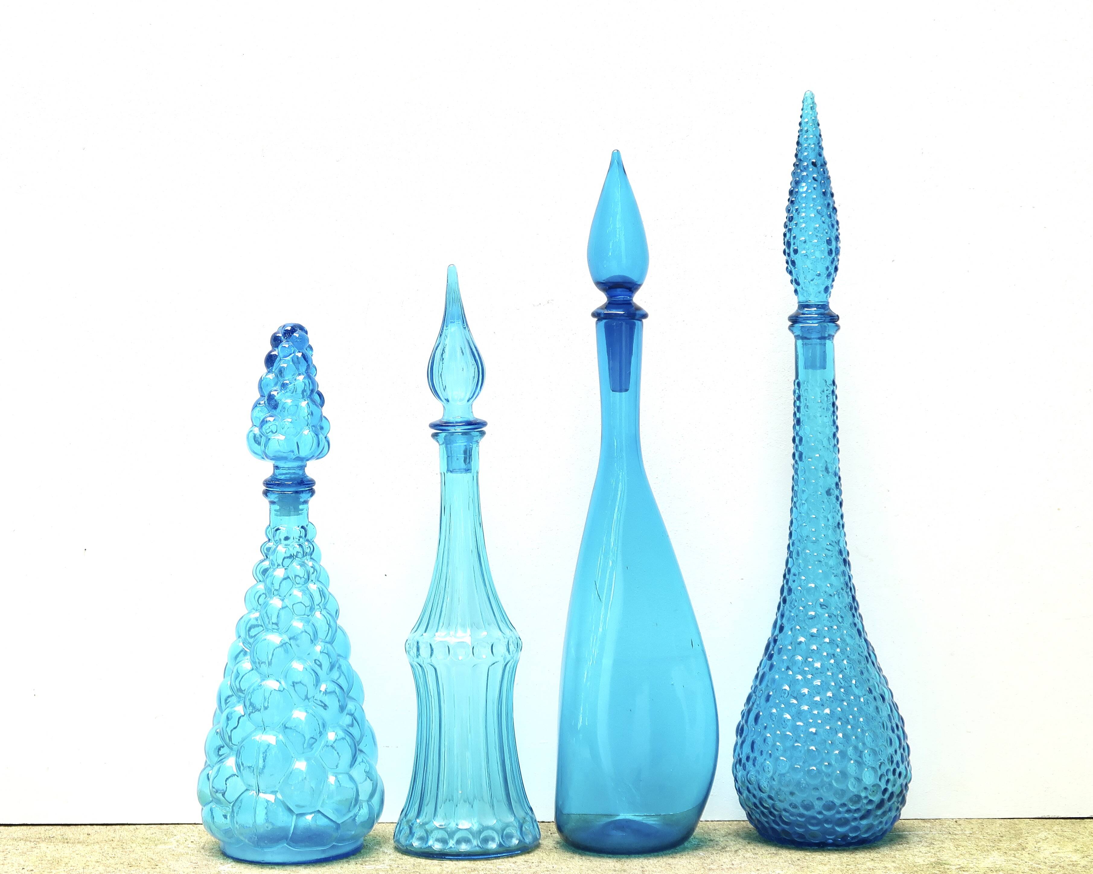Set of four Italian blue glass carafes, 1960s
