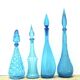 Set of four Italian blue glass carafes, 1960s