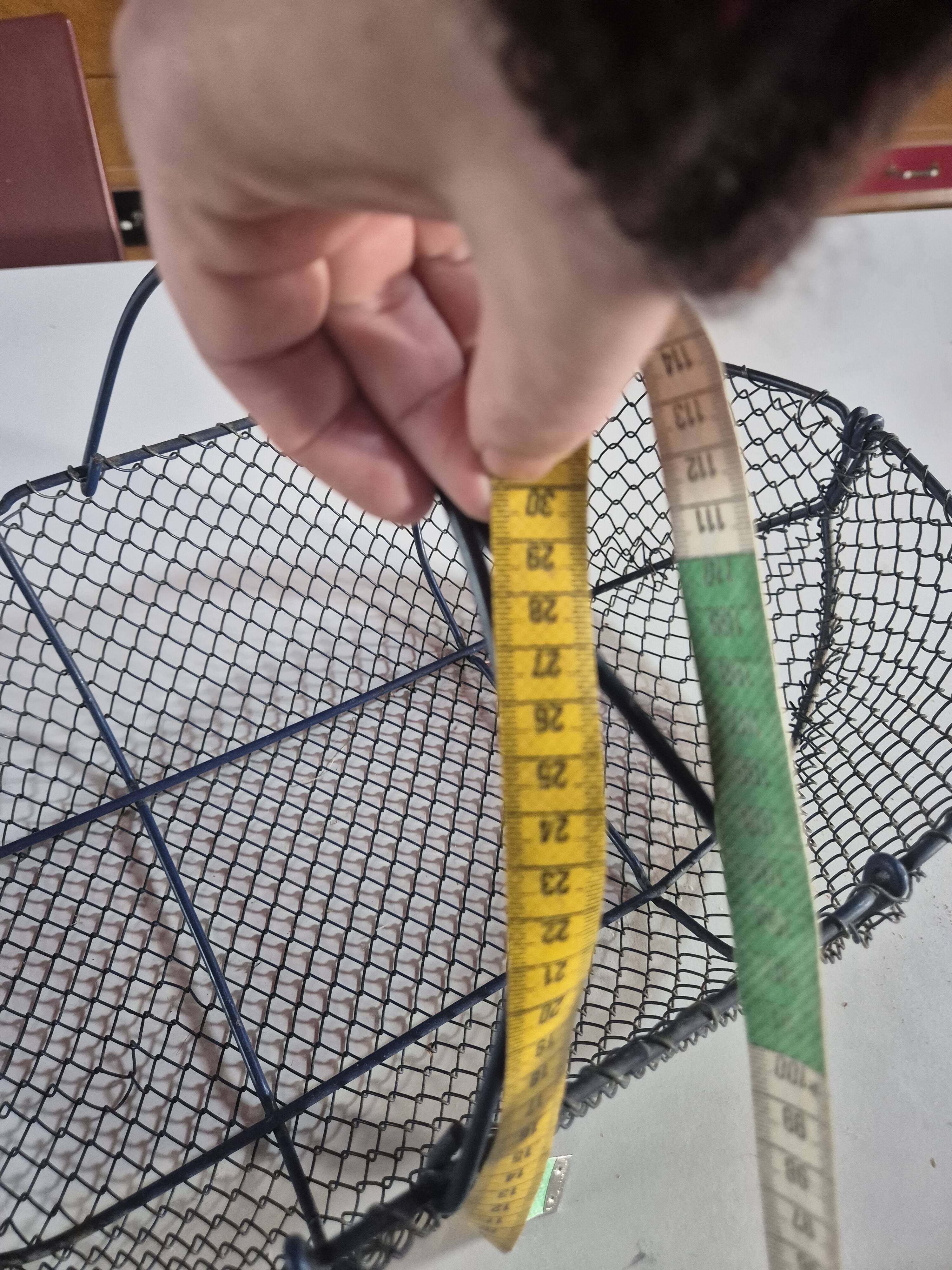 Vintage navy blue metal basket with wooden handle