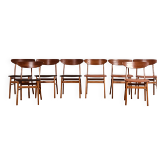 A set of 8 chairs by farstrup in teak, made in denmark