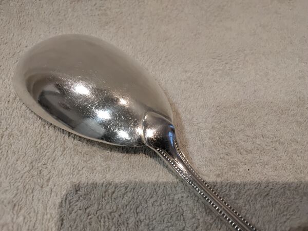 Pelle à servir le riz métal argenté orfèvre Christofle modèle perles