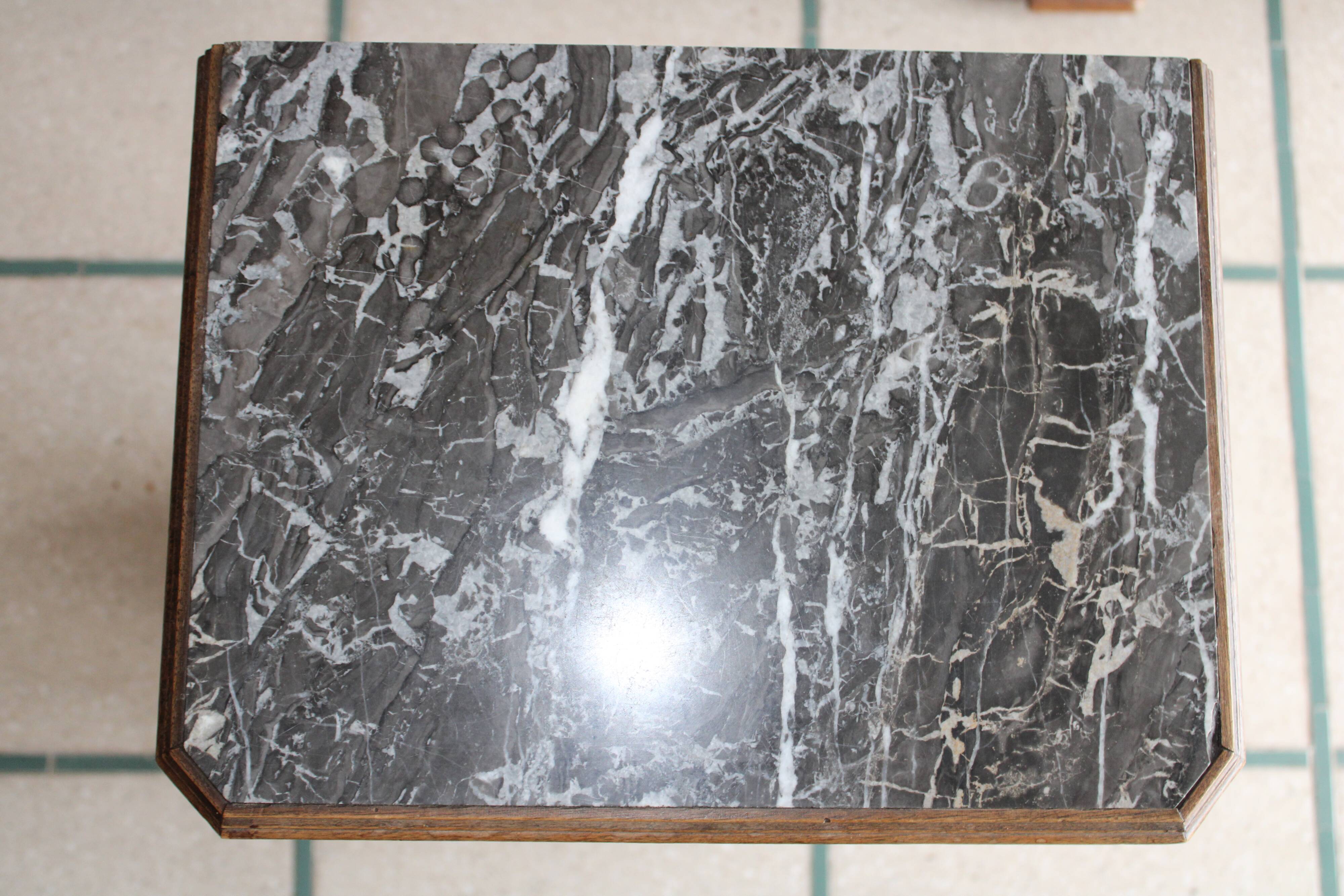 Antique bedside table with marble top