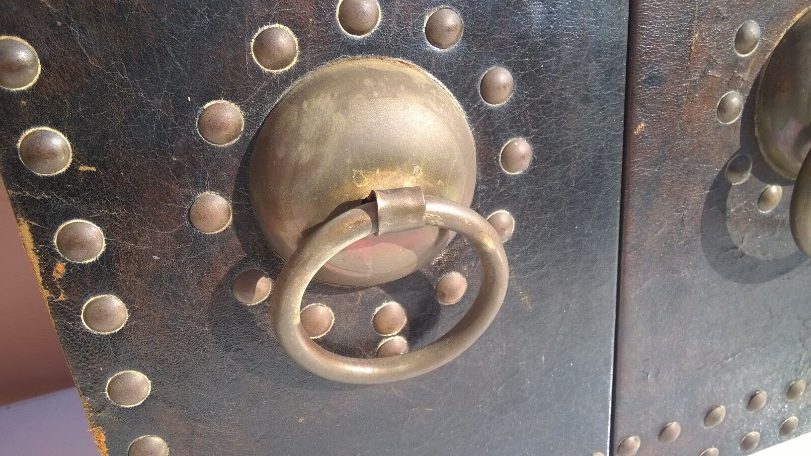 Oriental mirror leather and nails 28x55cm