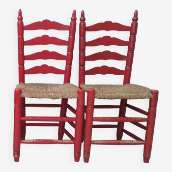 2 vintage red straw chairs