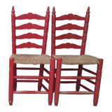 2 vintage red straw chairs