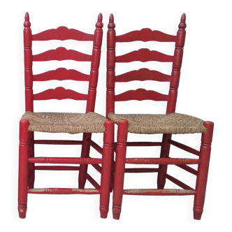 2 vintage red straw chairs