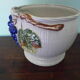 Ceramic flower pot with dabbling decorations