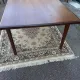 Rectangular extendable table in Scandinavian style made of teak.