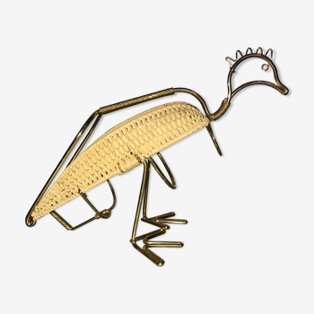 Brass duck and wicker bottle rack