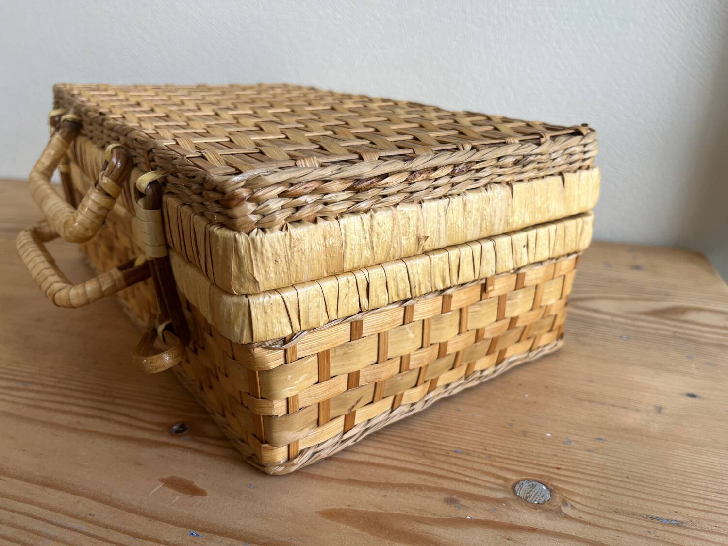 Vintage woven wicker suitcase
