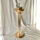 Old brass and chrome-plated metal ashtray on stand