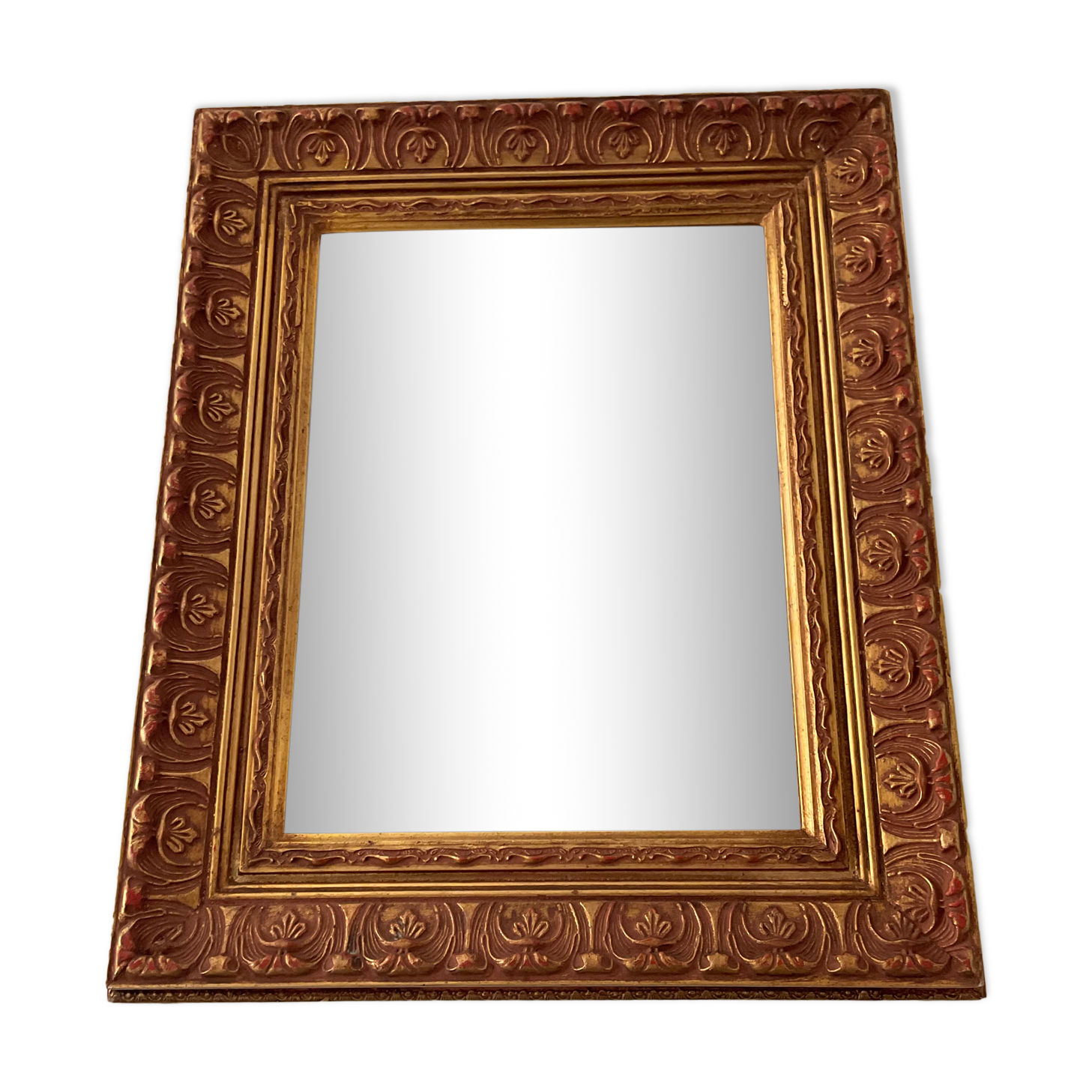 Old Beveled mirror in gilded wood