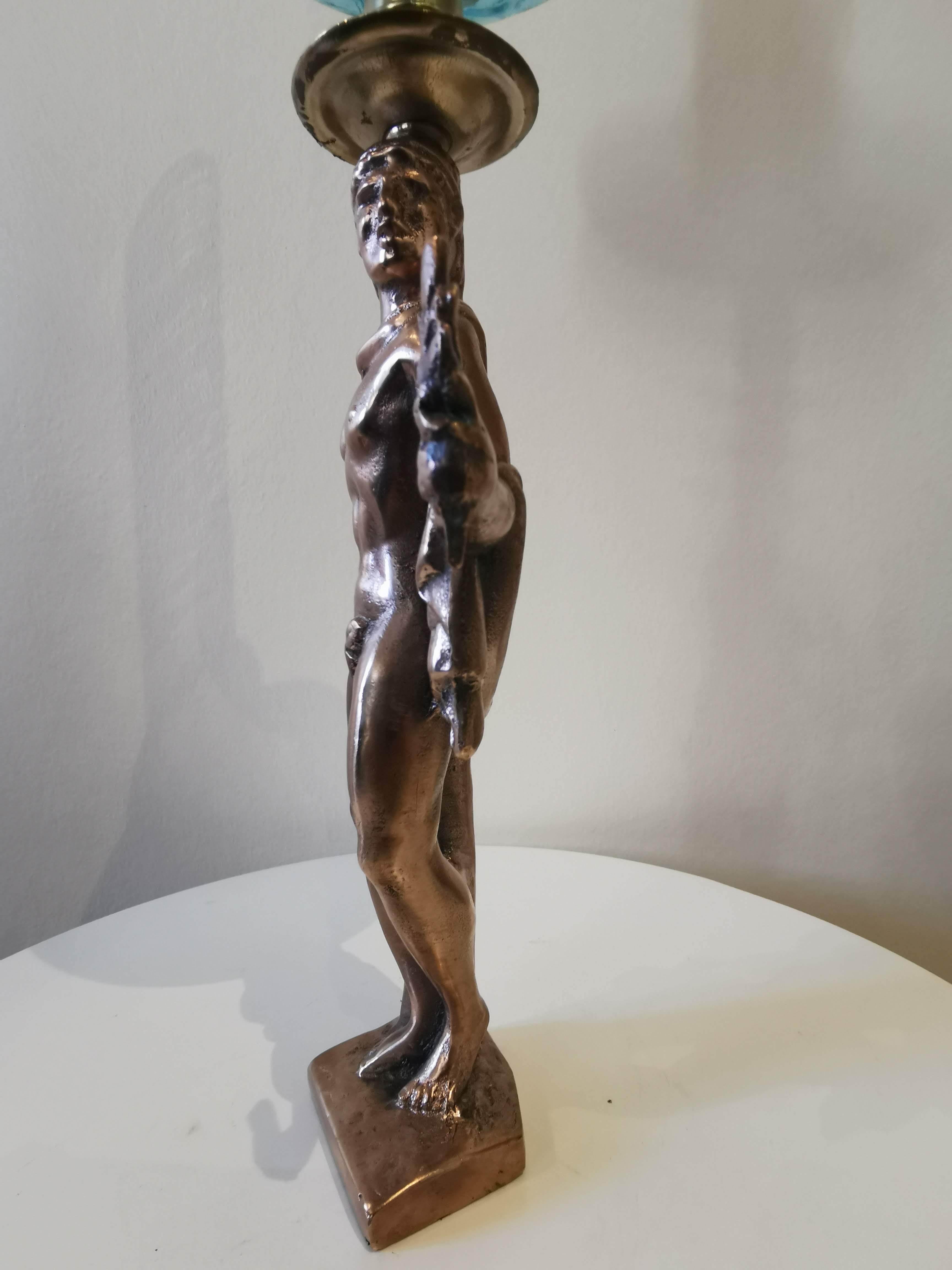 Large kerosene lamp mounted on bronze statue. Late nineteenth century