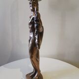 Large kerosene lamp mounted on bronze statue. Late nineteenth century